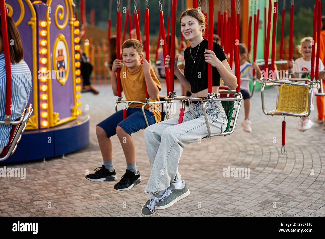 Boy enjoying swing ride playground hi-res stock photography and images ...