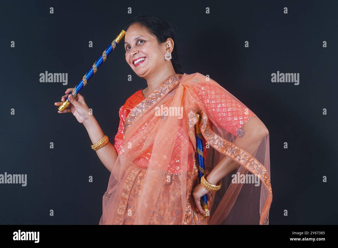 Young Indian women are shown in this colorful stock photo preparing to ...