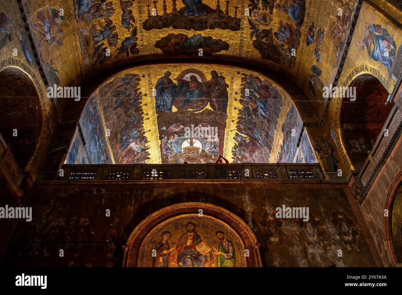 The richly decorated interior of St Mark's Basilica blends Renaissance, Byzantine, Venetian, and Islamic styles with stunning architecture and mosaics Stock Photo