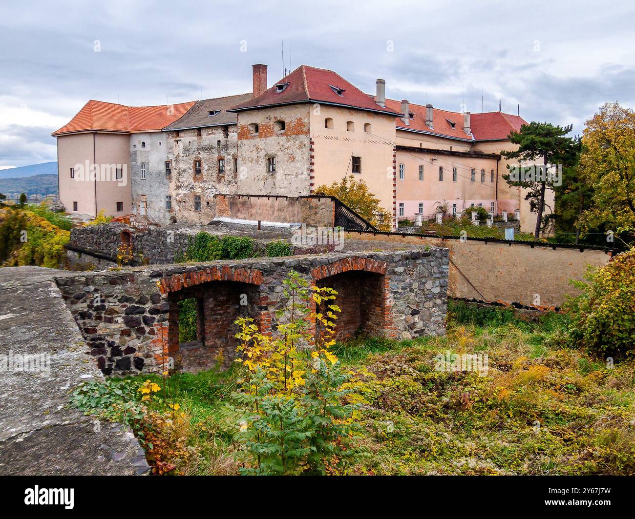 uzhhorod, ukraine - 20 oct 2007: castle on restoration. urban scenery on a cloudy day in autumn. popular travel destination Stock Photo
