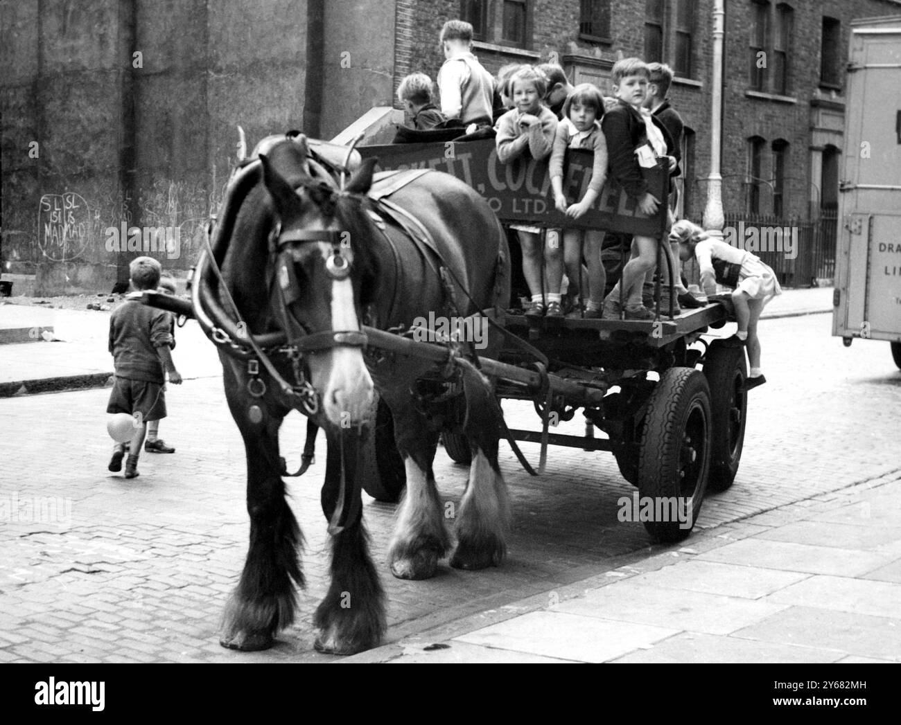Children riding on horse and cart stock photo alamy