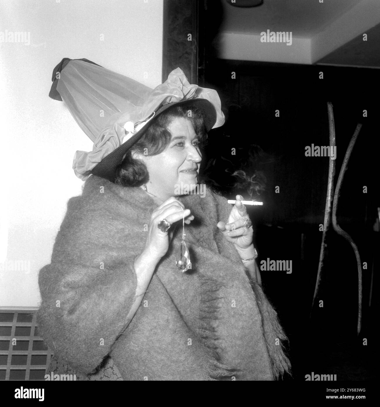 Southampton Hampshire: Smoking a cigarette and wearing her witches hat ...