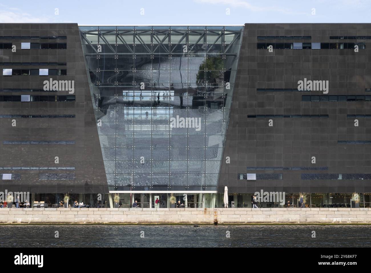 Extension to the Danish Royal Library with concert hall, also known as the Black Diamond or Diamond Variety because of its facade, contemporary archi Stock Photo