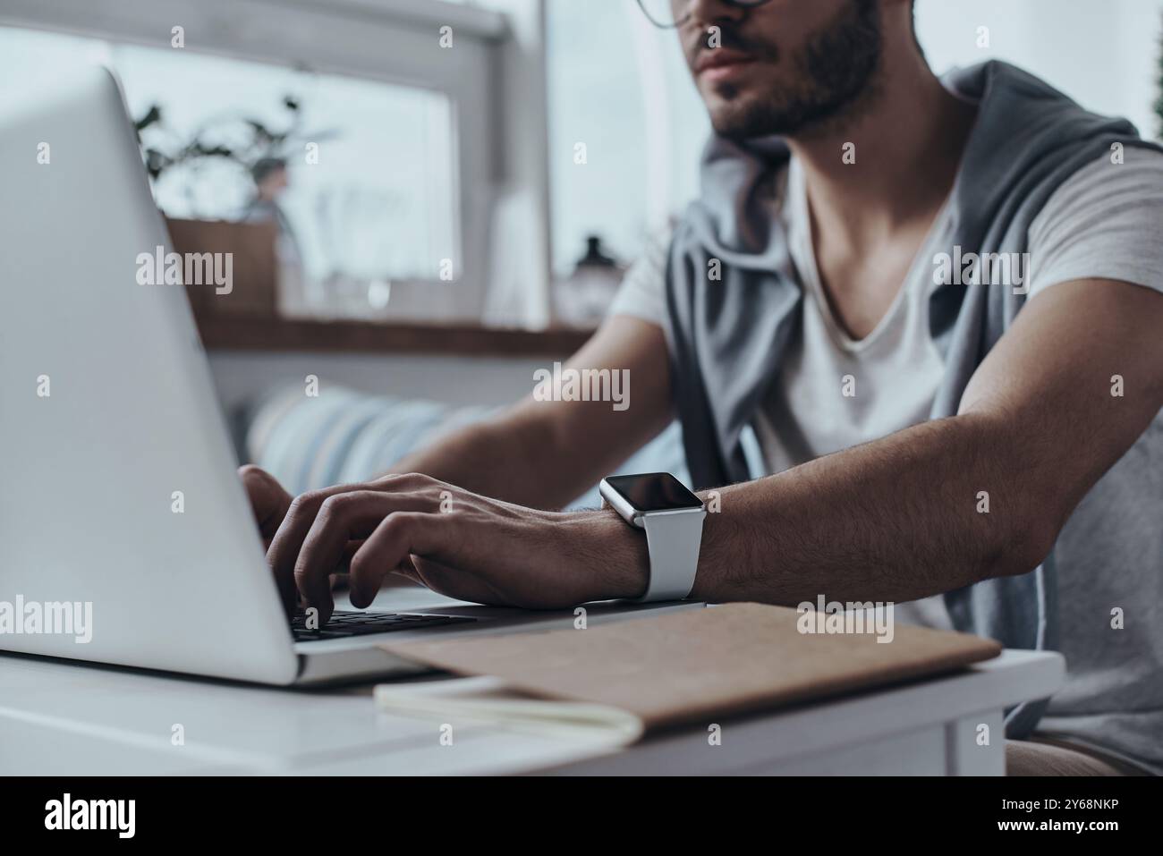 Man is surfing on new technologies hi-res stock photography and images ...