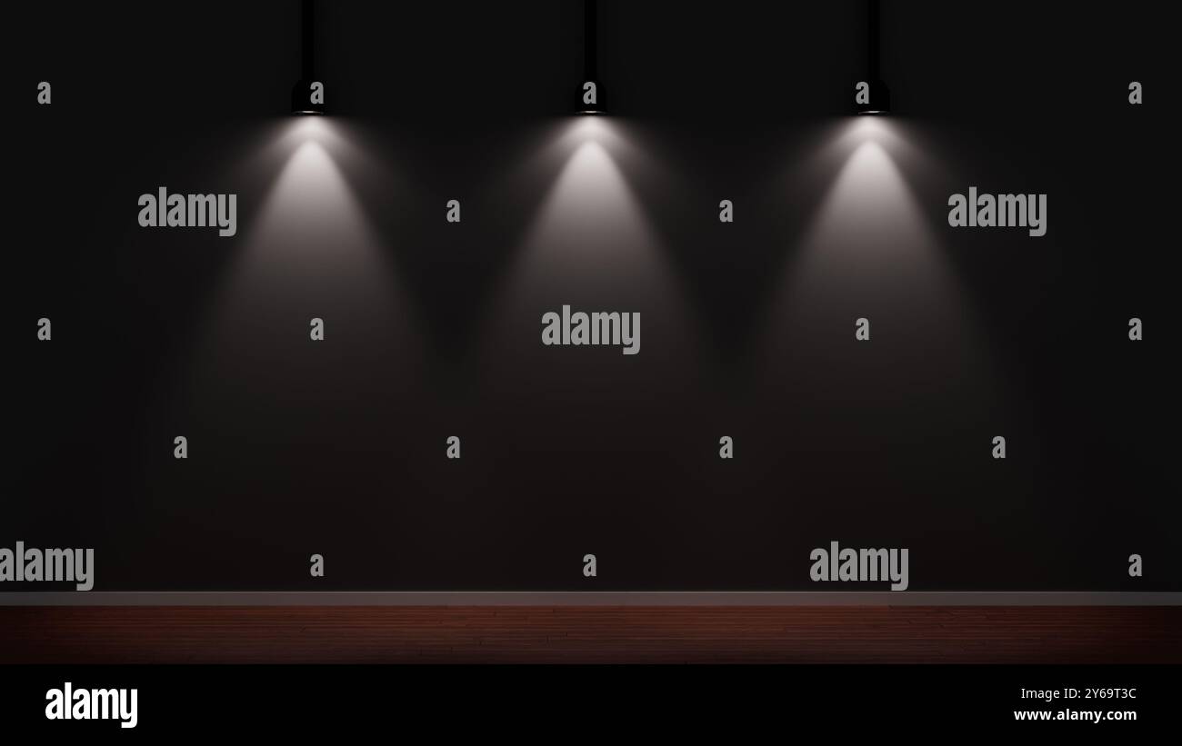 Three spotlights dramatically illuminate a black wall in a dark studio ...