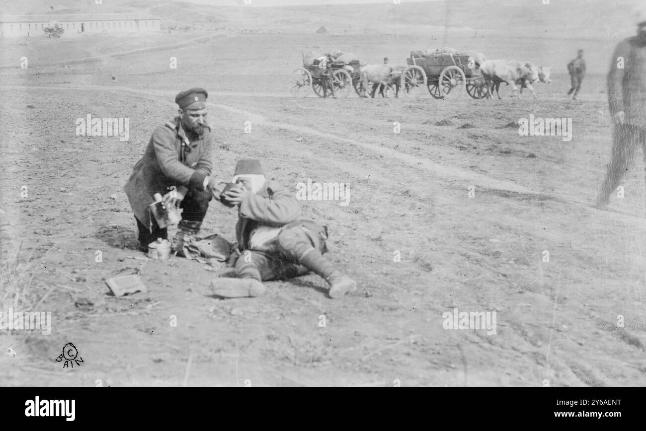 Bulgarian giving water to dying Turk, Adrianople, Photo related to Battle of Adrianople, 1912-13, First Balkan War., 1912, Adrianople, Glass negatives, 1 negative: glass; 5 x 7 in. or smaller. Stock Photo