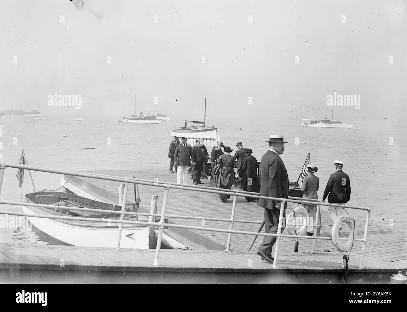 Haldane party boarding Morgan yacht, Photo shows Judge Dickinson, J.P. Morgan, Jr., Richard Burdon Sanderson Haldane, 1st Viscount Haldane (1856-1928) and others boarding yacht., 1913 Aug. 30, Glass negatives, 1 negative: glass; 5 x 7 in. or smaller. Stock Photo