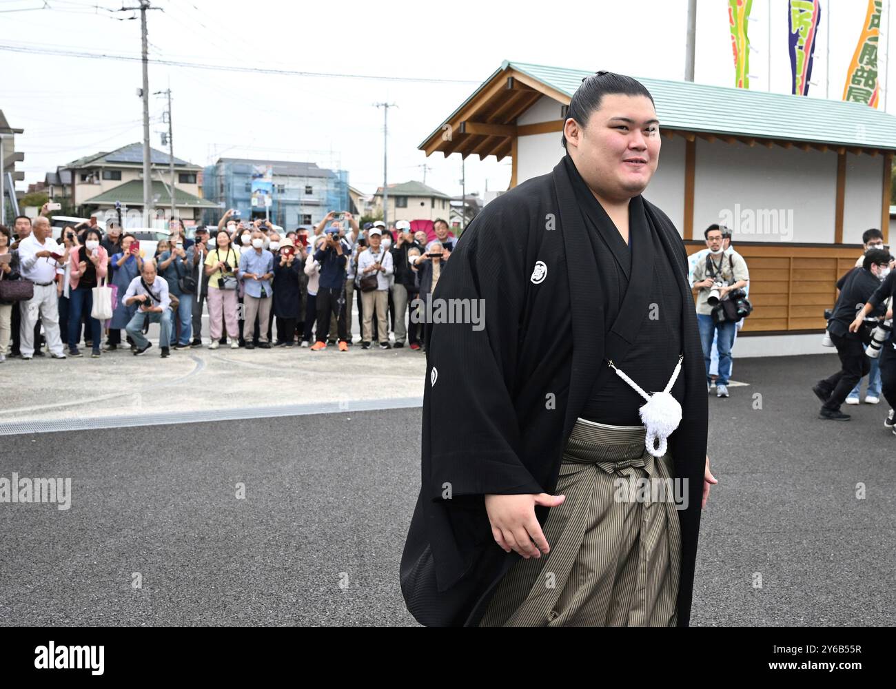 Japanese sumo wrestler Onosato reacts after the ceremony 