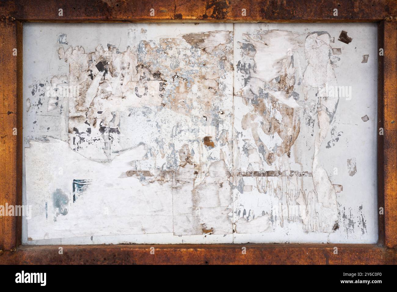 Old advertising board with rusty frame background Stock Photo