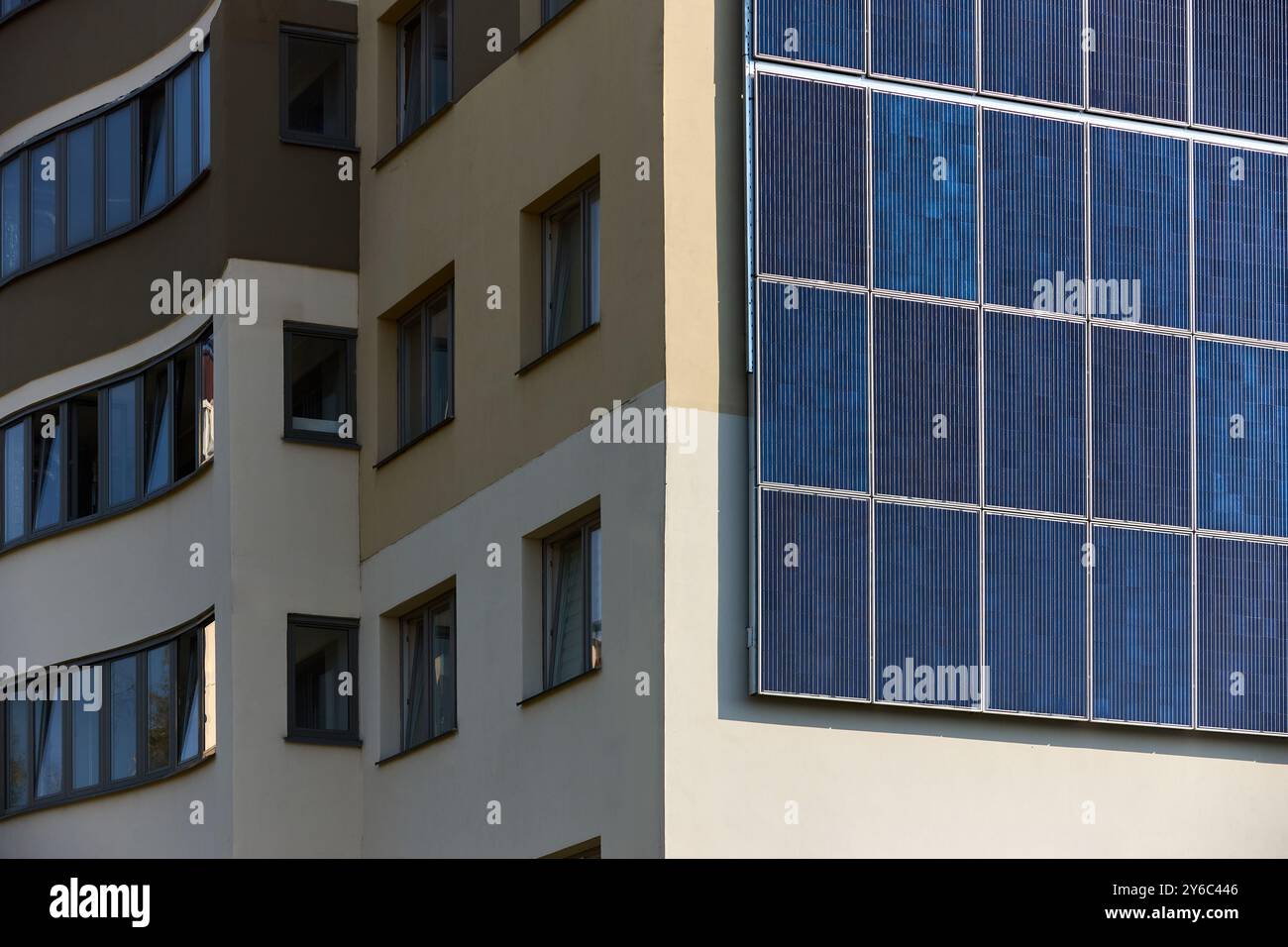 Building with lots of solar panels. Renewable solar energy. Alternative ...