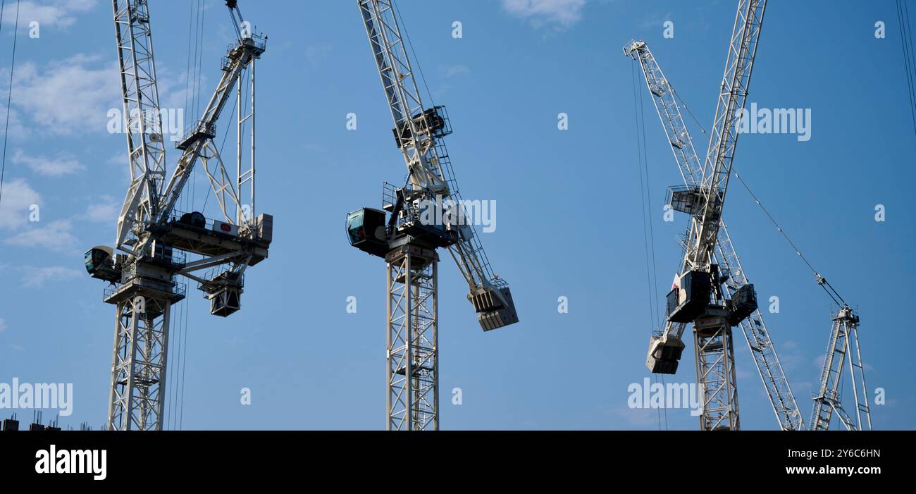 Construction industry cranes, Manchester, NW England, UK Stock Photo