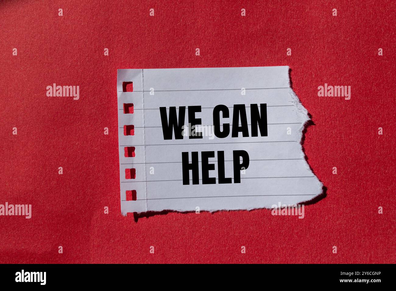 We can help message written on ripped torn paper with red background ...