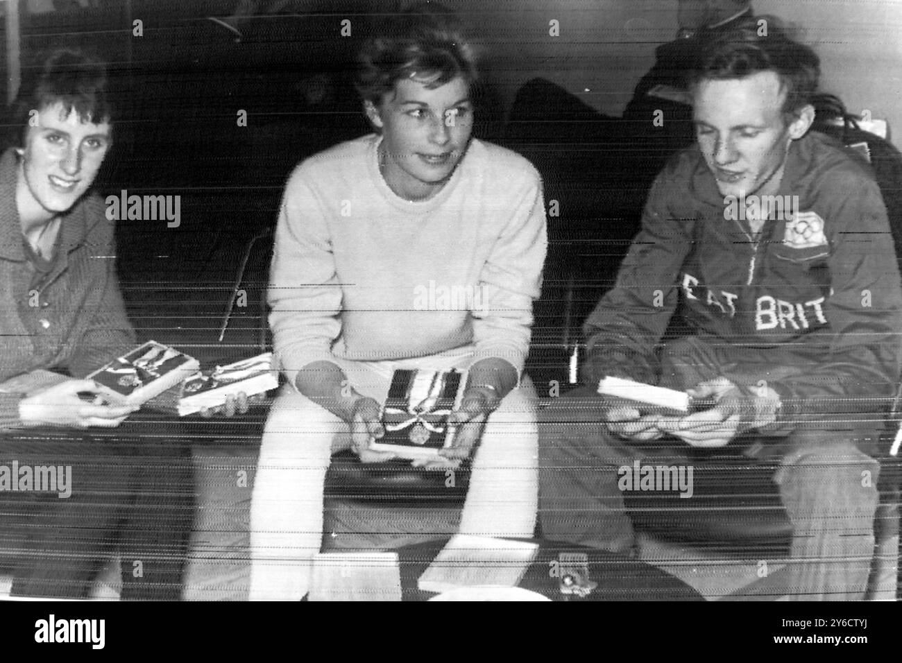 ATHLETE DOROHTY HYMAN WITH MARY RAND AND BRUCE TULLOCH IN TOKYO, JAPAN /  ;  16 OCTOBER 1963 Stock Photo