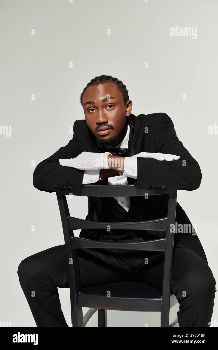 Man in formal attire leans hi-res stock photography and images - Alamy