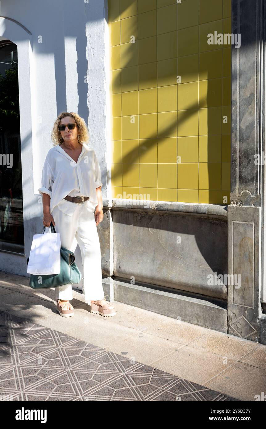 Stylish mature woman walks hi-res stock photography and images - Alamy