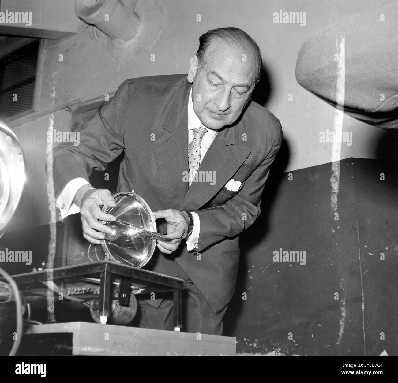 ENGINEER INVENTOR FELIX LEVY WITH HIS NEW CAR HEADLAMP IN NICE, FRANCE ...