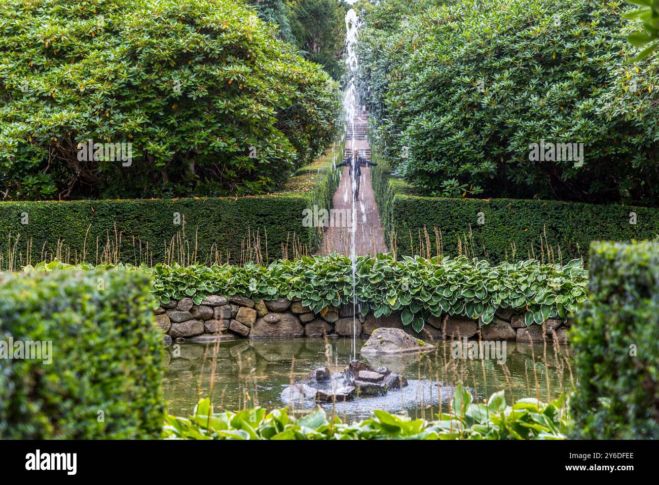 The romantic park at Krapperups Slott was designed in the 19th century under the direction of the Danish landscape architect Edvard Glæsel. It includes winding paths, carp ponds, rhododendron bushes and an impressive rose garden with over 600 rose plants. The park is open to the public all year roundKrapperup Castle and Park. Krapperupsvägen, Höganäs kommun, Skåne, Sweden Stock Photo