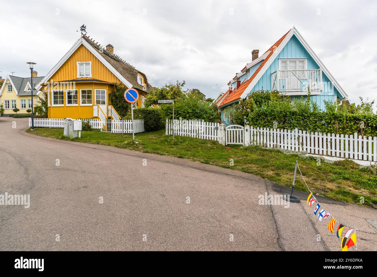 Picturesque houses in the harbour town of Arilds hamn. Vallstigen, Höganäs kommun, Skåne, Sweden Stock Photo
