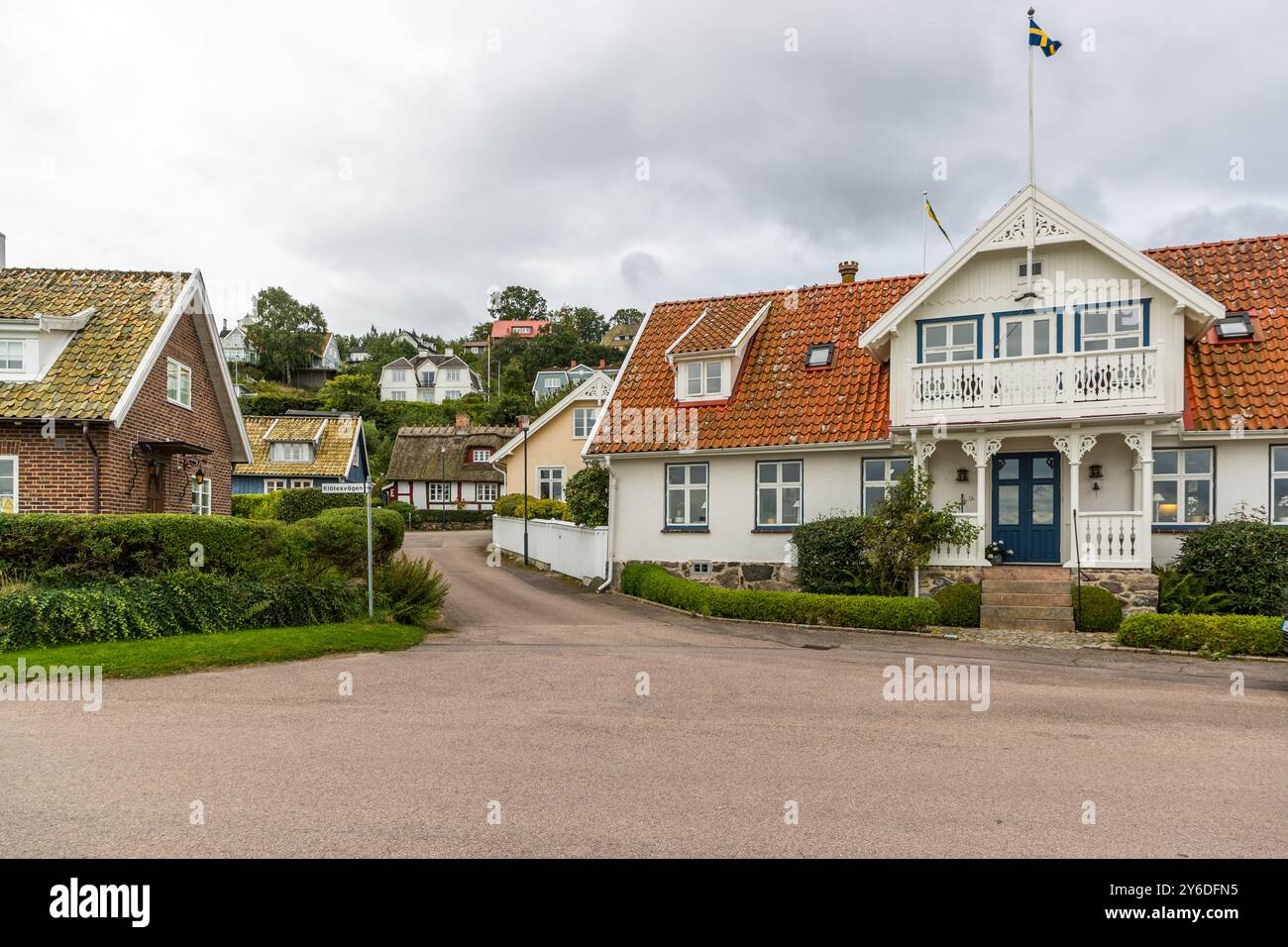 Picturesque houses in the harbour town of Arilds hamn. Klötesvägen, Höganäs kommun, Skåne, Sweden Stock Photo