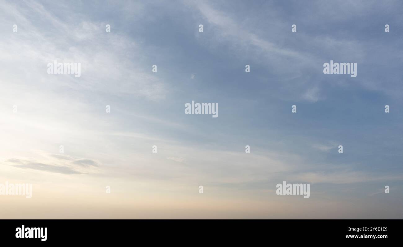 Sunset sky background with fluffy background Stock Photo - Alamy