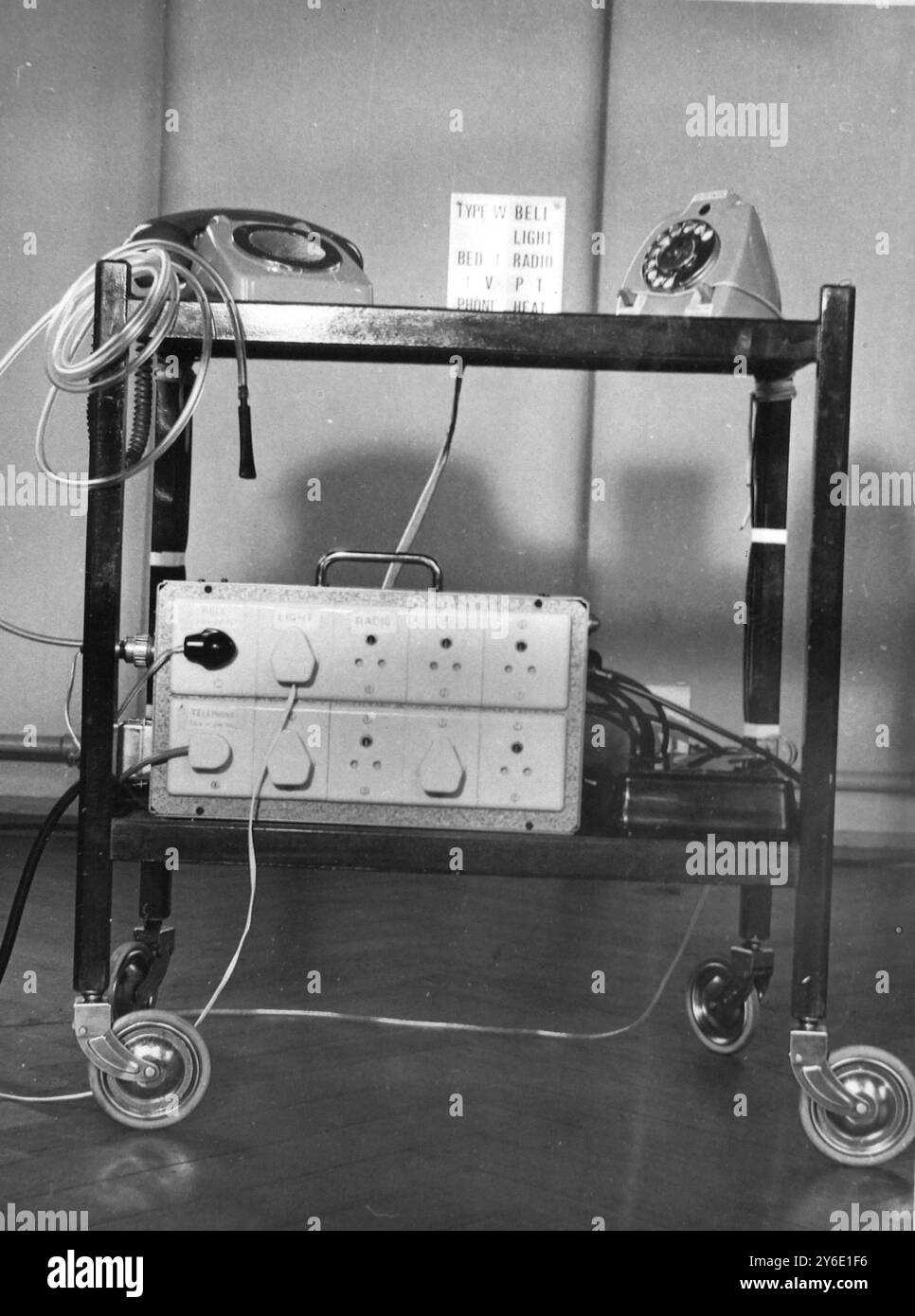 HOSPITAL DISABLE PERSON USING ELECTRIC CONTROLLER IN STOKE MANDEVILLE  ;  28 JANUARY 1963 Stock Photo