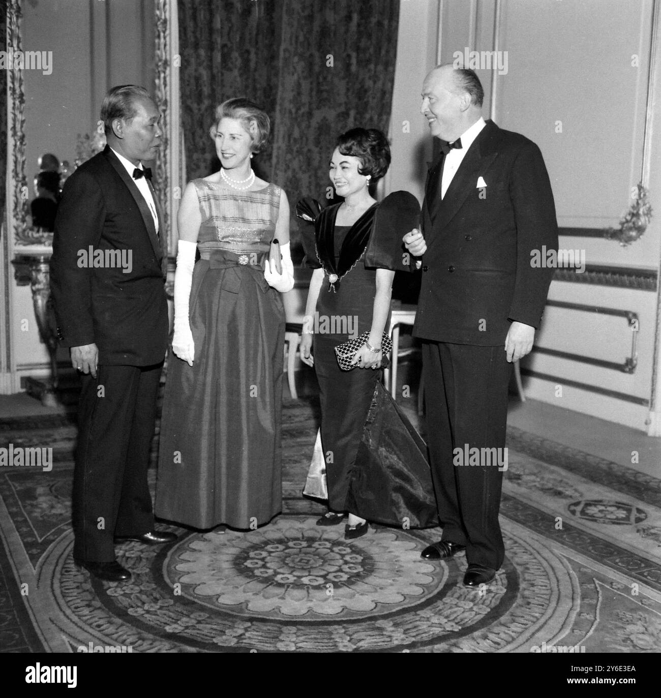 PETER THORNEYCROFT AND MACARIO PERALTA WITH WIVES  IN LONDON /  ;  24 JANUARY 1963 Stock Photo