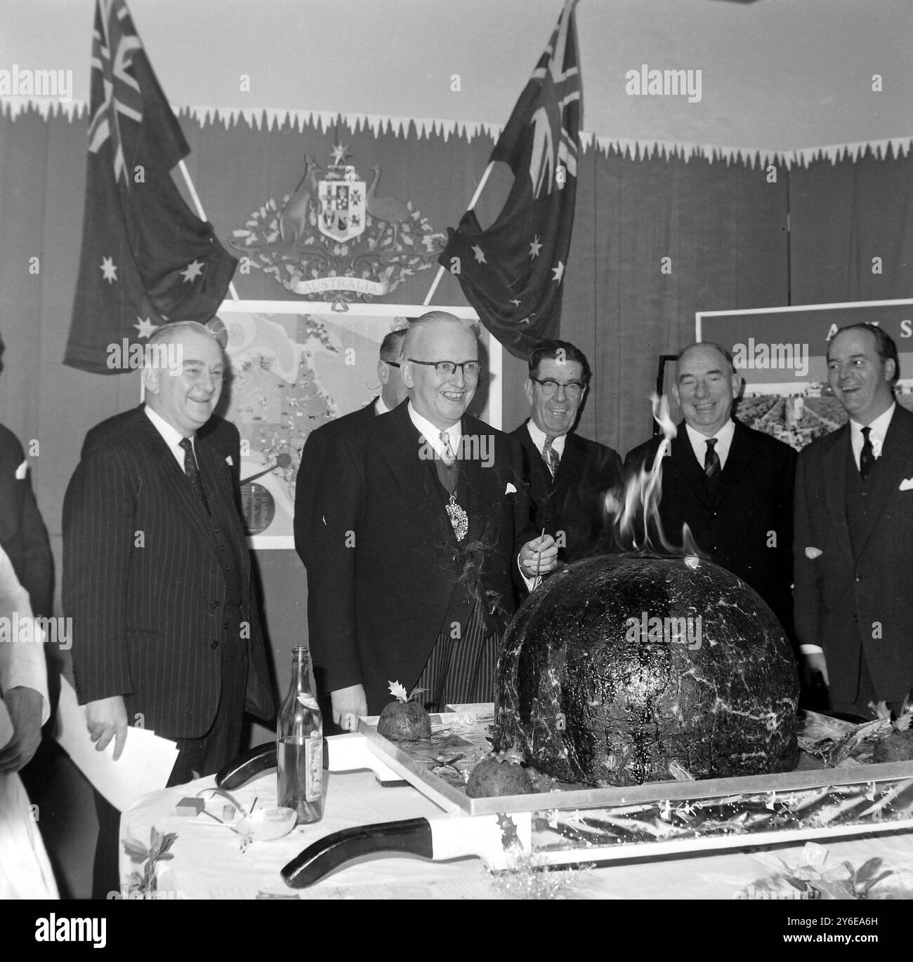 CHRISTMAS THE LORD MAYOR OF LONDON RALPH PERRING SETS LIGHT TO PUDDING ...