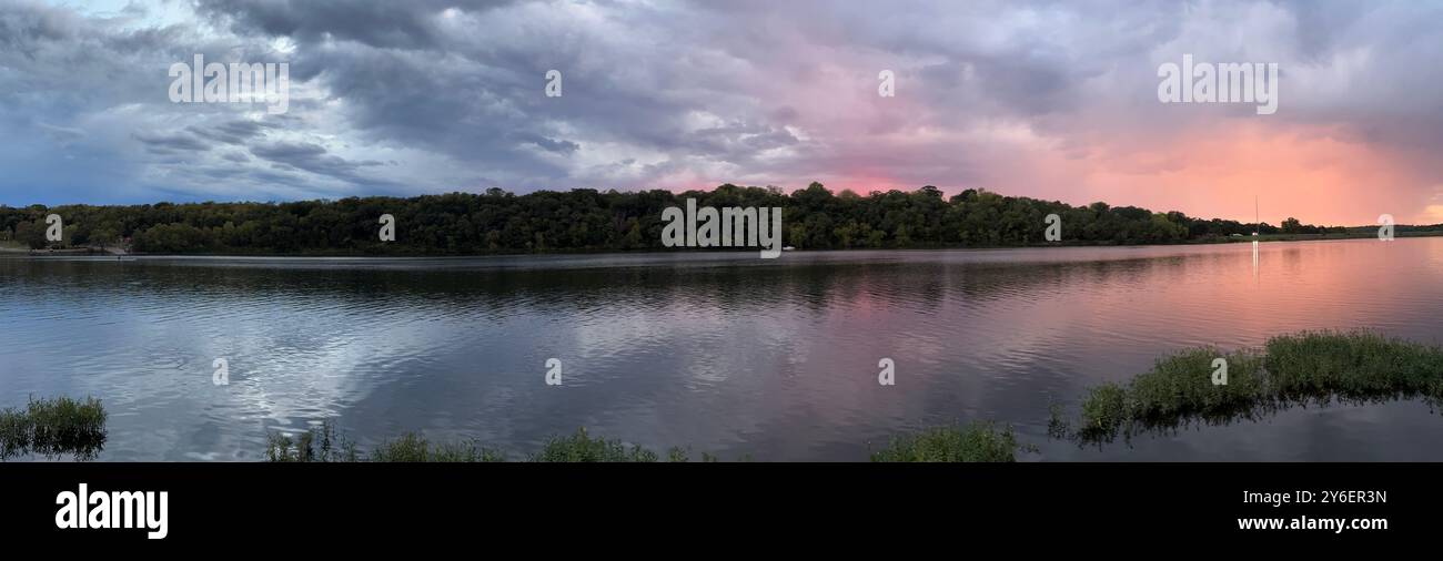 Cloudy Sunset Over an Lake Olathe Kansas Public Park Stock Photo