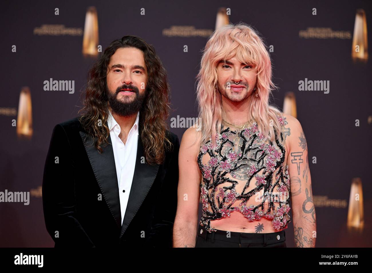 Cologne, Germany. 25th Sep, 2024. Brothers Tom Kaulitz (l) and Bill