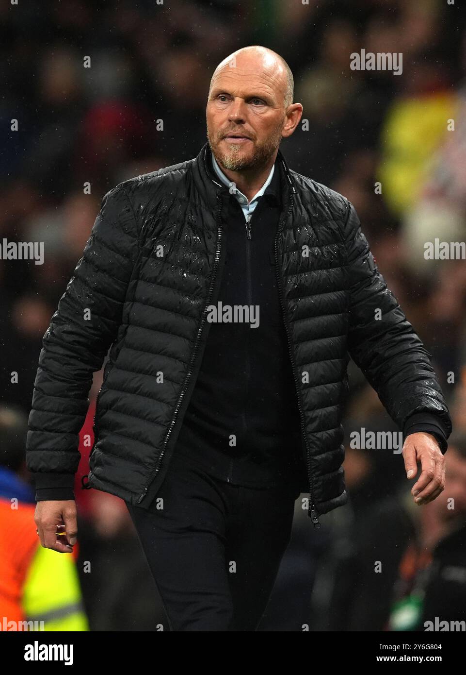 Twente manager Joseph Oosting walks to the tunnel at the end of the first half during the UEFA Europa League match at Old Trafford, Manchester. Picture date: Wednesday September 25, 2024. Stock Photo