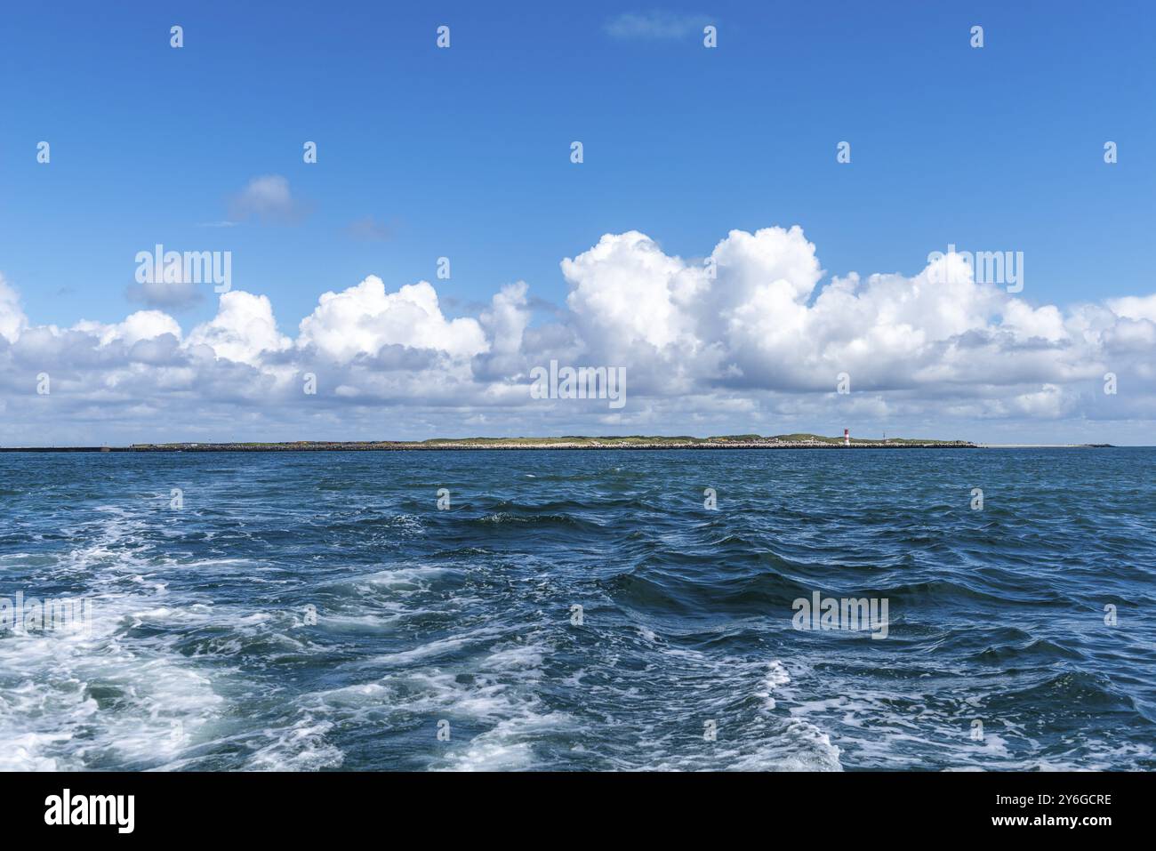 Dune of the high sea island Helgoland, south beach with lighthouse, swell, cloudy sky, sunshine, North Sea, district Pinneberg, Schleswig-Holstein, Ge Stock Photo