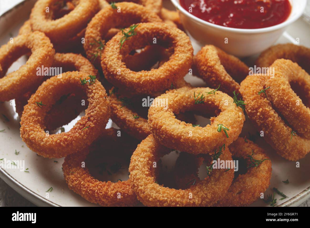 Food, Deep fried onion rings, appetizer, with tomato sauce, on a light ...