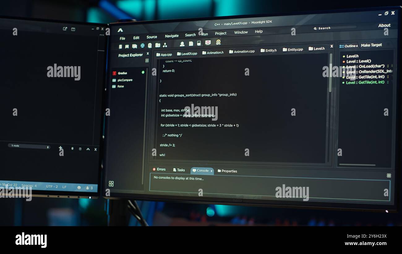 Technician doing software quality assurance, reading source code on PC before implementing it. IT admin inspecting coding on computer, looking to fix potential issues, camera A close up Stock Photo