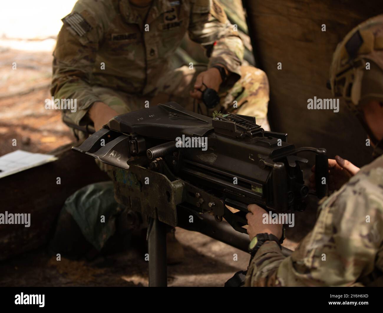 A Paratrooper assigned to the 82nd Airborne Division, handles the Mark ...