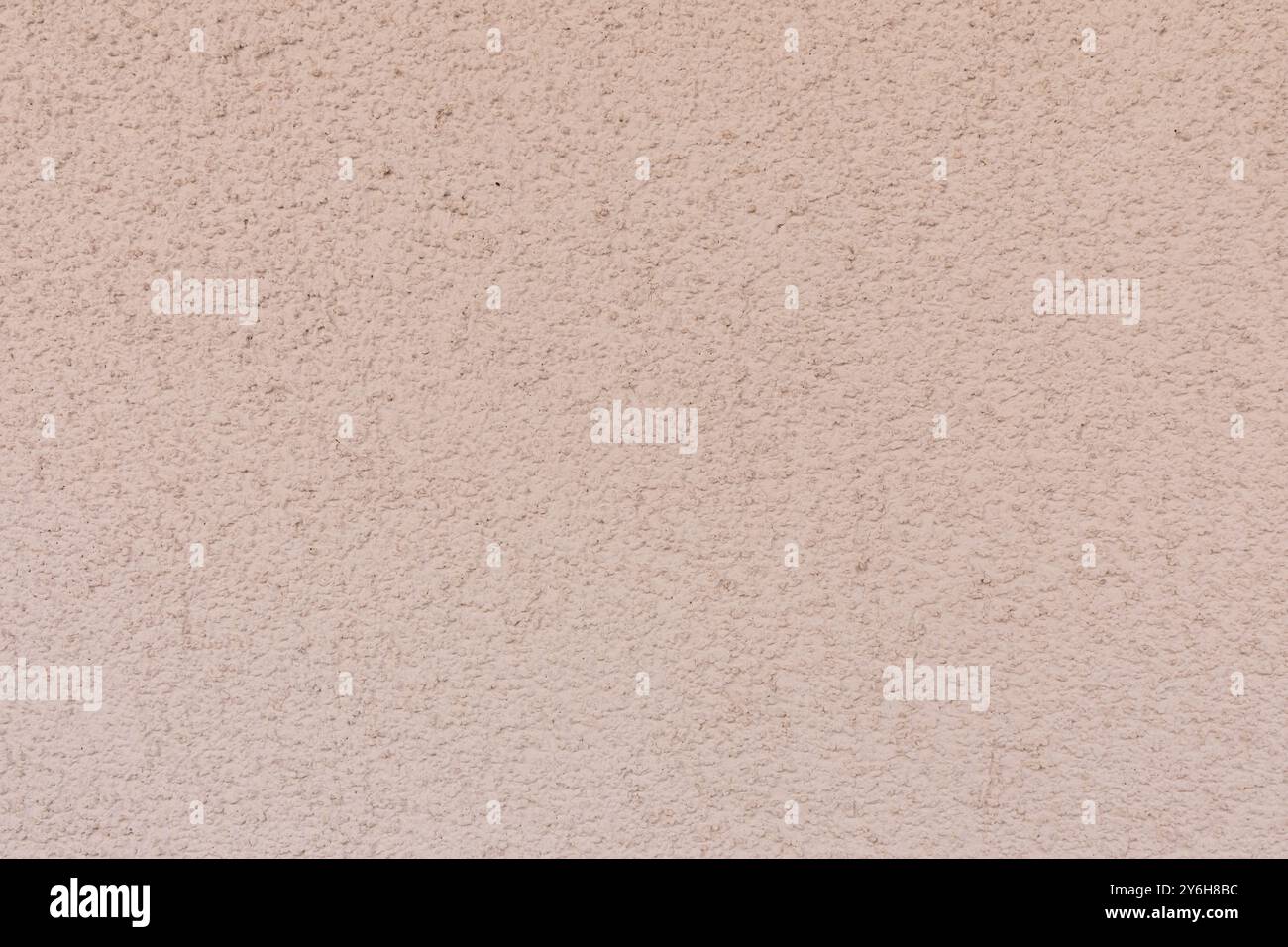 Light Pink Textured Wall Background Perfect for Digital Design and Creative Projects. Stock Photo