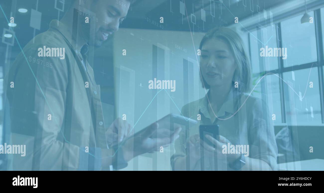 Image of diagrams and data processing over diverse colleagues discussing work Stock Photo