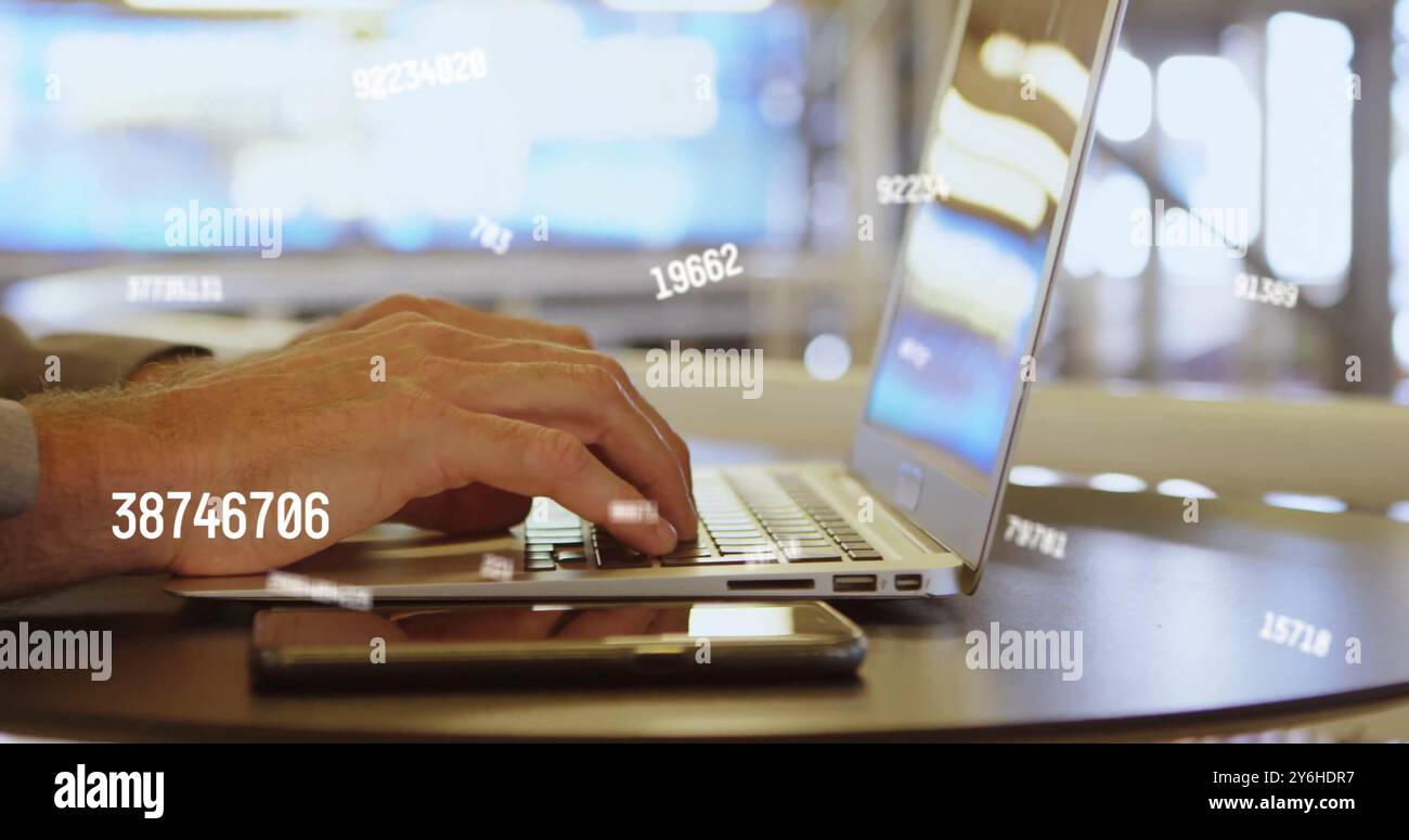 Image of data processing over caucasian businessman using laptop in office Stock Photo