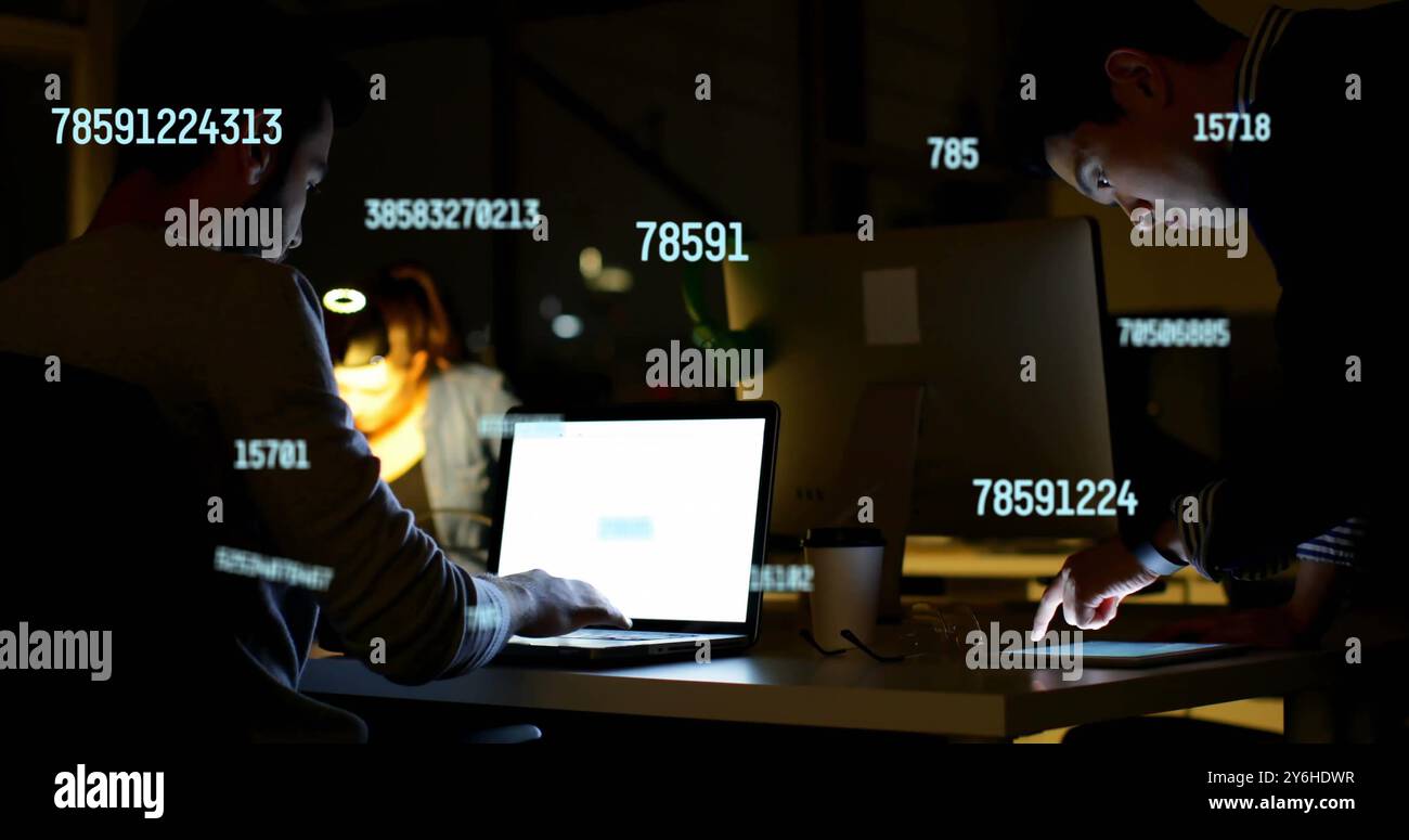 Image of data processing over diverse collleagues working in office Stock Photo