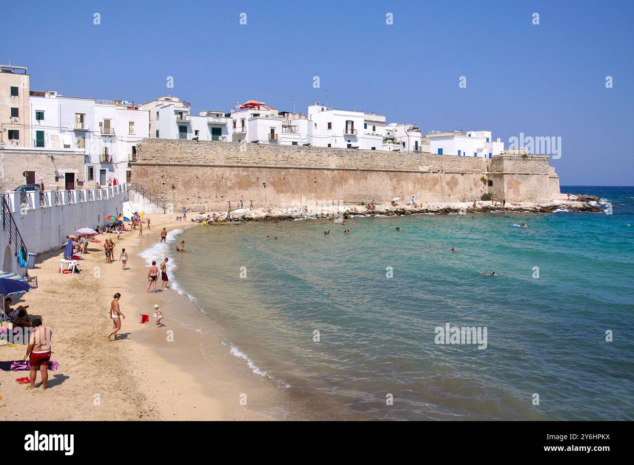 Old Town walls and beach, Old Town, Monopoli, Bari Province, Puglia Region, Italy Stock Photo