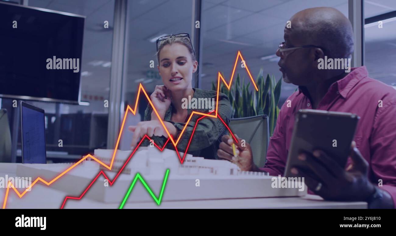 Image of data processing over diverse business people in office Stock Photo