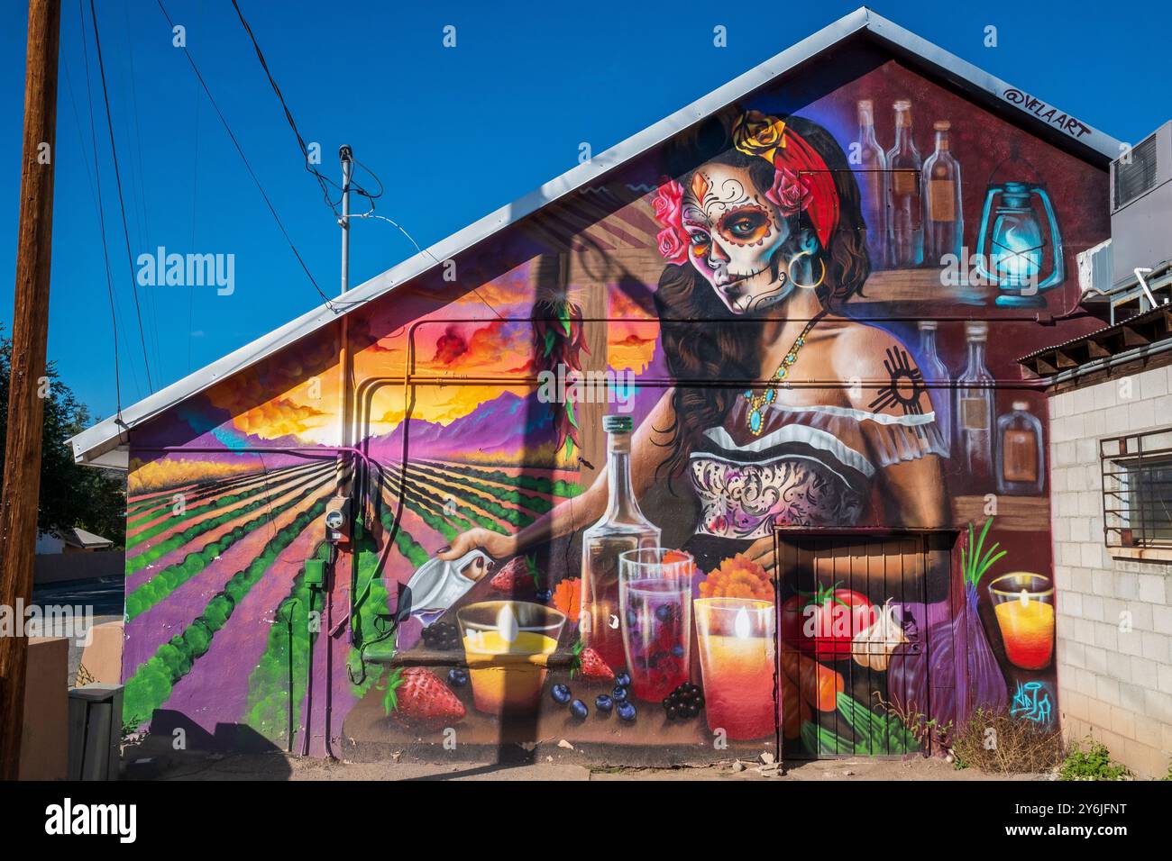 A colorful Day of the Dead mural on a wall in Ojo Caliente, New Mexico, USA Stock Photo