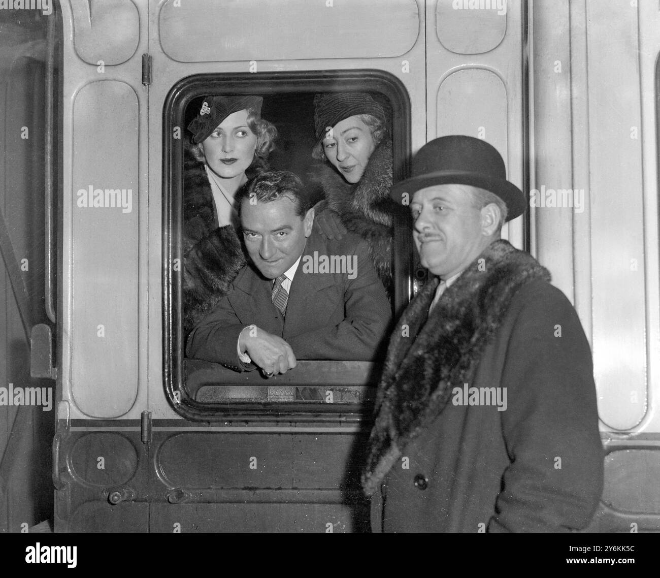 Molison At Paddington Station. Mr William Mollison (in carriage window ...