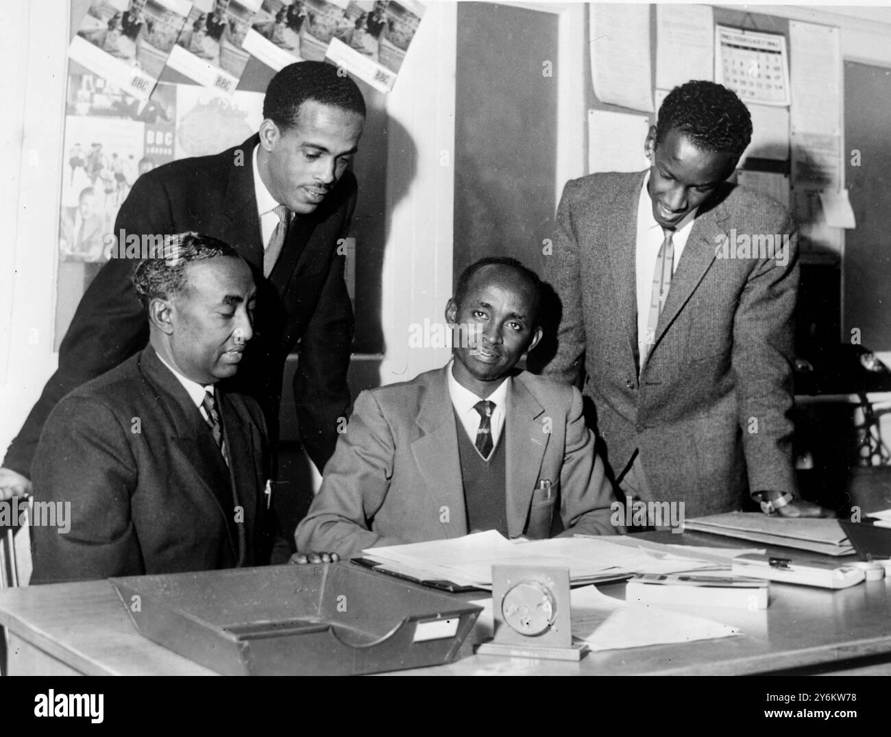 London: Abdi Dualeh the well-known broadcaster from Radio Hargeisa made several broadcasts while in London recently and is here seen with three members of the BBC Swahili Service. left to right Abdi Dualeh; Ismail Ali Sheikh Maddar; Jama Khalaf Farah and Mohomed Abshir Yusuf. Dualah was a pioneer for broadcasting in the ex-somaliland Protectorate and his services were marked by the award of the British Empire Medal in 1953, Since the Independance of the Somali Republic Mr Dualeh has continued to broadcast from Radio Hageisa and has recently acted as information Officer for the Northern Region. Stock Photo