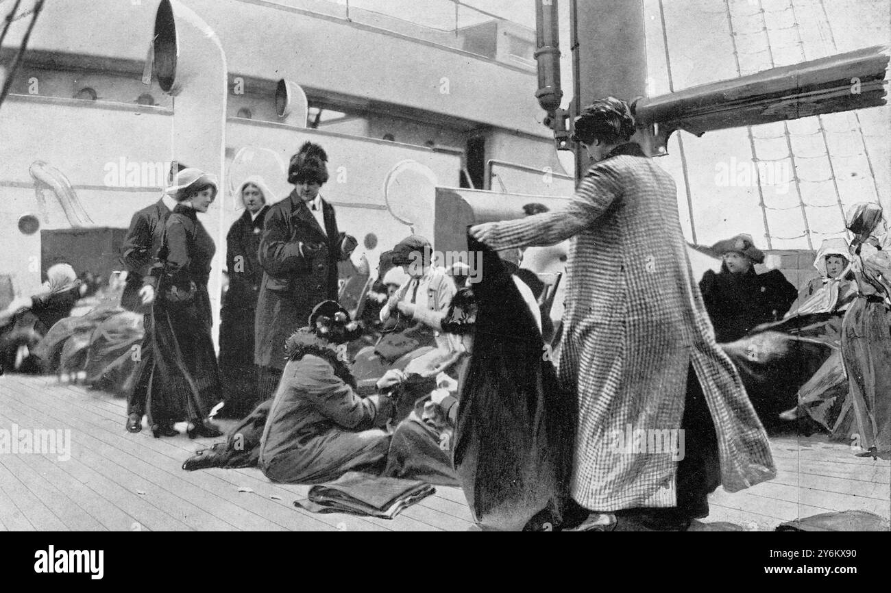 Aboard the rescue ship: 'Titanic' survivors on the 'Carpathia' succouring the saved: Women passengers on the 'Carpathia' sewing for the 'Titanic' survivors and distributing clothes.  4 May 1912 Stock Photo