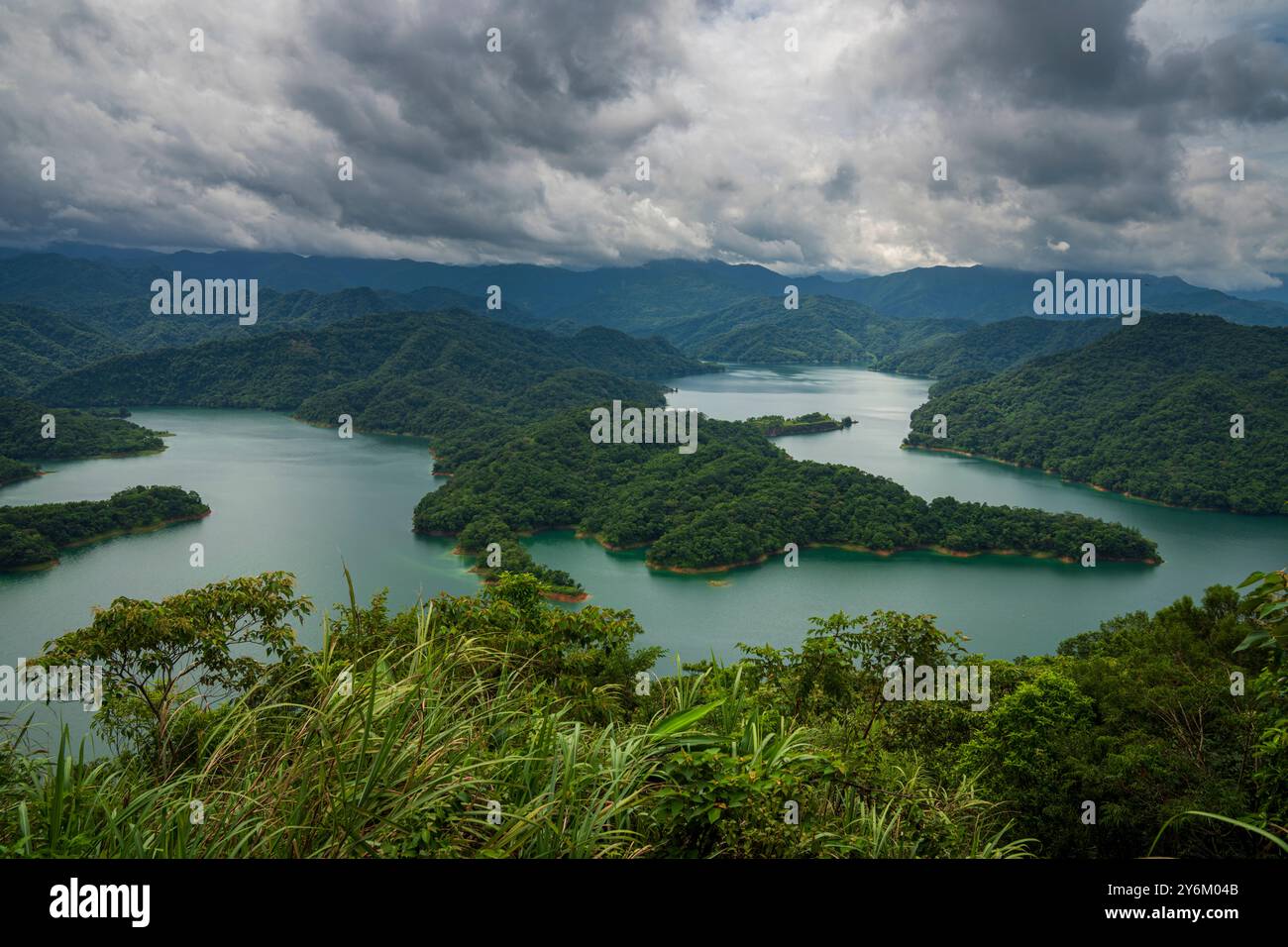 Crocodile island lake and storm clouds in Taiwan Stock Photo