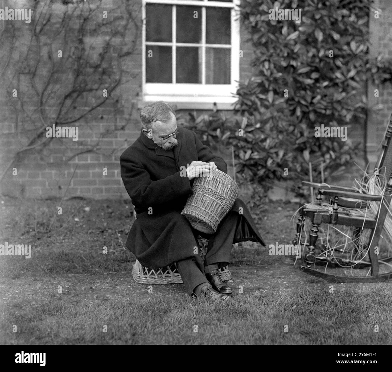 The Reverend T. Smith, vicar of St John's, Harrow, re-bottoming chairs ...