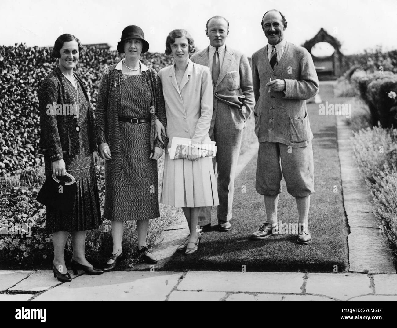 Colonel and Mrs Horlick's house party at 'Grey Walls', Gullane Princess Aspasia pf Greece, Mrs Horlick, Princess and Prince Philip of Hesse and Col Horlick  1930 Stock Photo