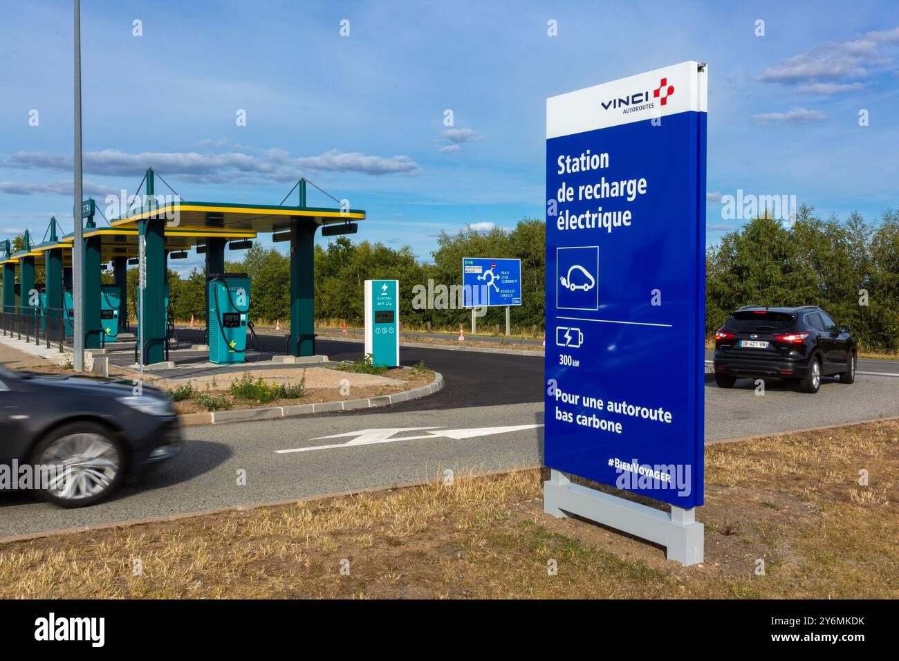 Electric car charging station on a motorway rest area. Vinci Electra ...