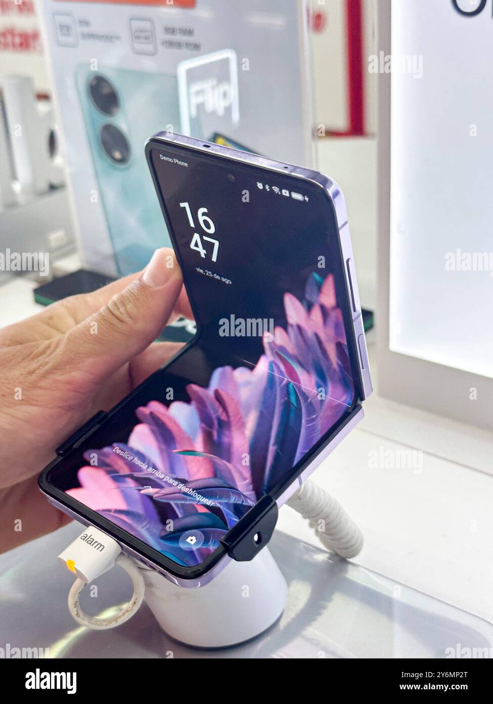 Smartphone with a screen that folds in half. Samsung Galaxy Z Flip3 5G Stock Photo