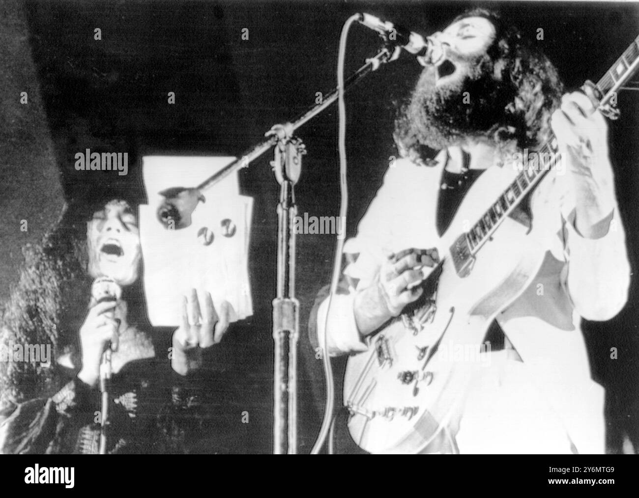 John Lennon and his wife Yoko Ono performing at the 'Toronto Rock & Roll Revival' in an unscheduled appearance. During the performance the couple were booed off the stage. 20,000 fans waited for four hours before the couple went on at the Varsity Arena, in their first stage appearance together. 14th September 1969 577928 Stock Photo